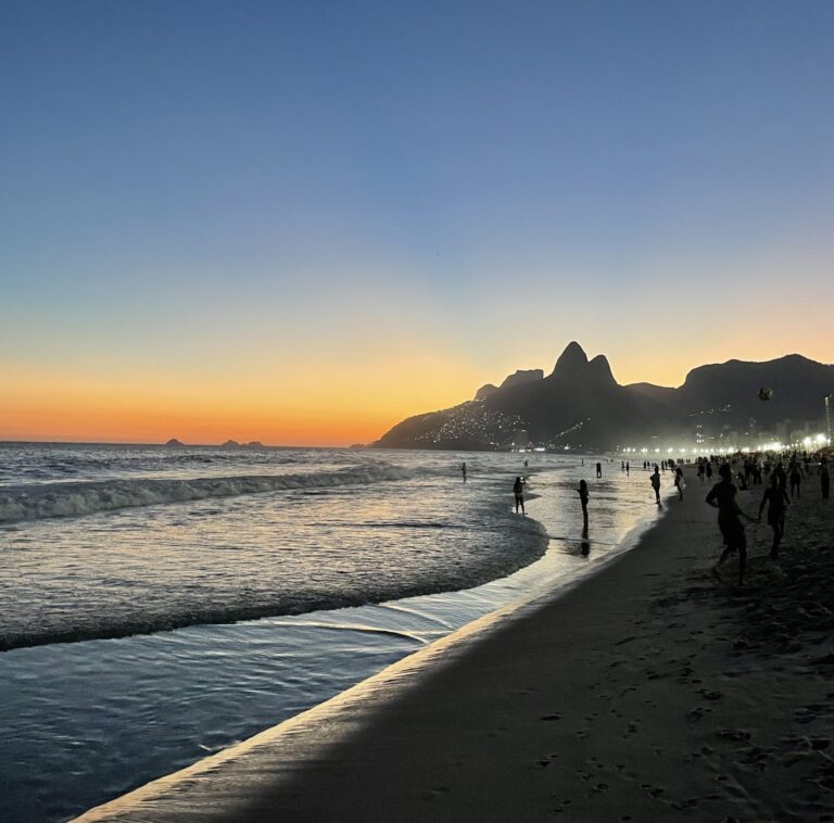 A colorful sunset at Ipanema Beach in Rio de Janeiro, Brazil