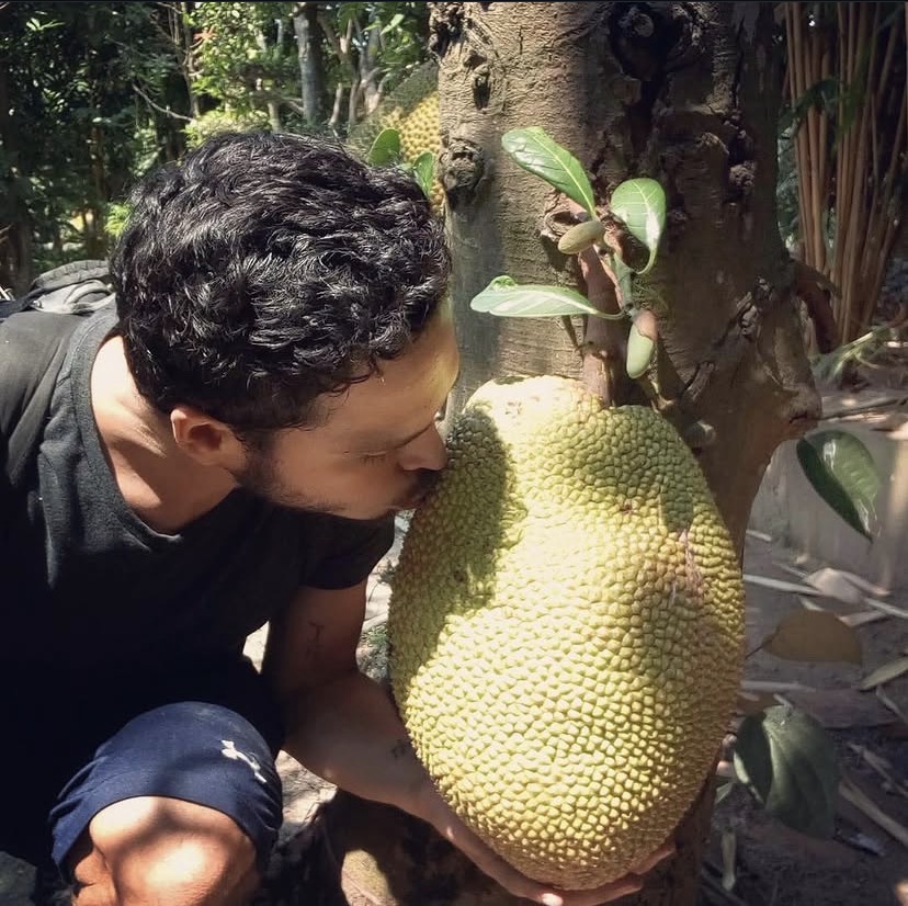 Me kissing a low hanging Jackfruit on a Jackfruit tree