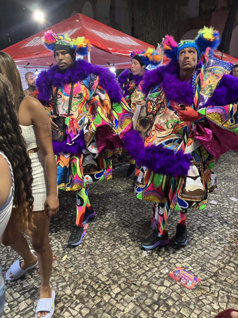 Two Brazilians wearing extravagant tribal costumes during Carnival in Rio de Janeiro