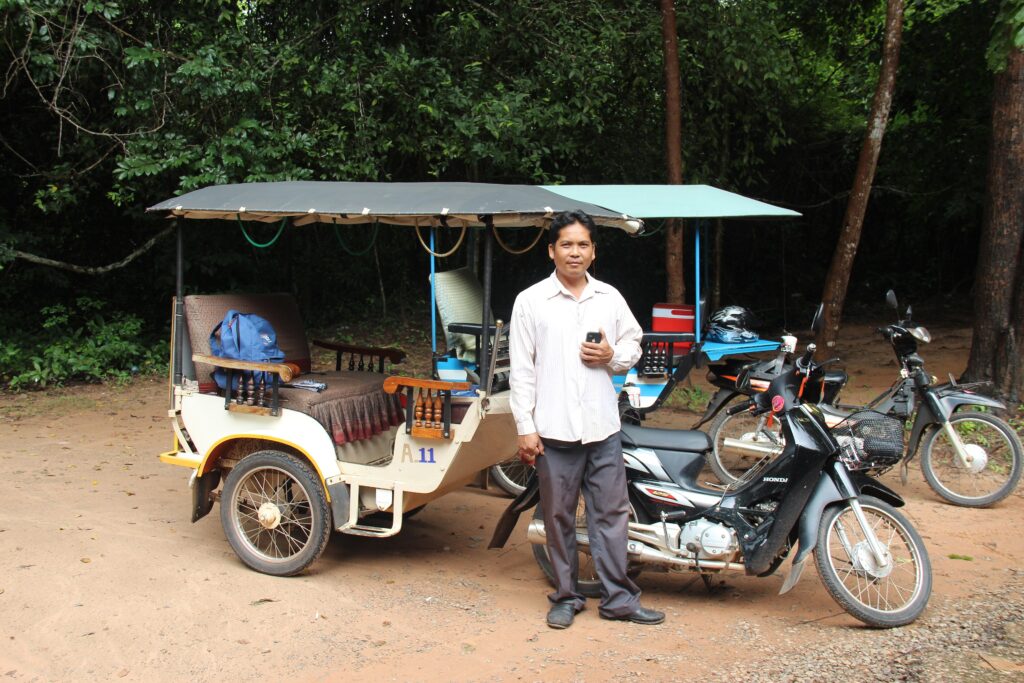 Traditional Cambodian tuk-tuk and driver