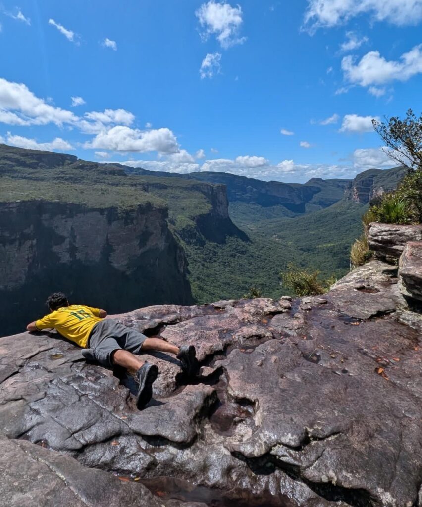 Me leaning over the edge of a cliff at Chapada Diamantina National Park
