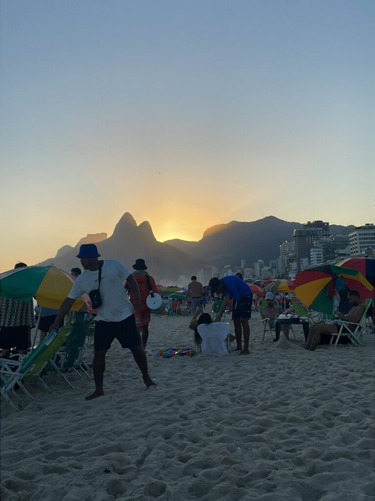 Vendors selling food and items at Ipanema Beach in Rio de Janeiro, Brazil