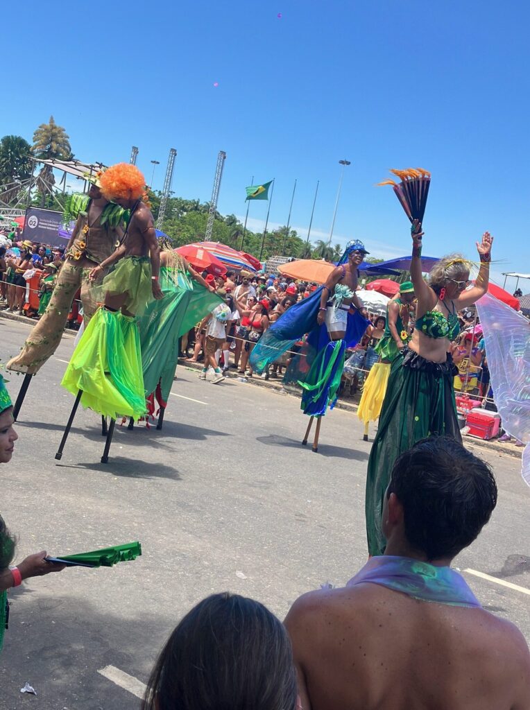 Performers walking on stilts during a street parade in Rio de Janeiro during Carnival
