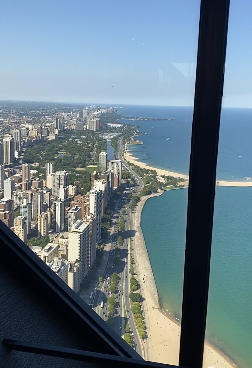 A view of the Chicago coastline and Lake Michigan from the 360 Chicago observation deck