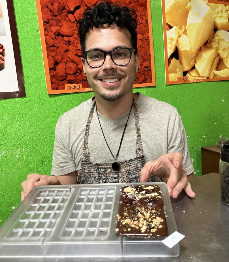 Me with a chocolate bar I made at a chocolate making working at ChocoMuseo in Antigua, Guatemala